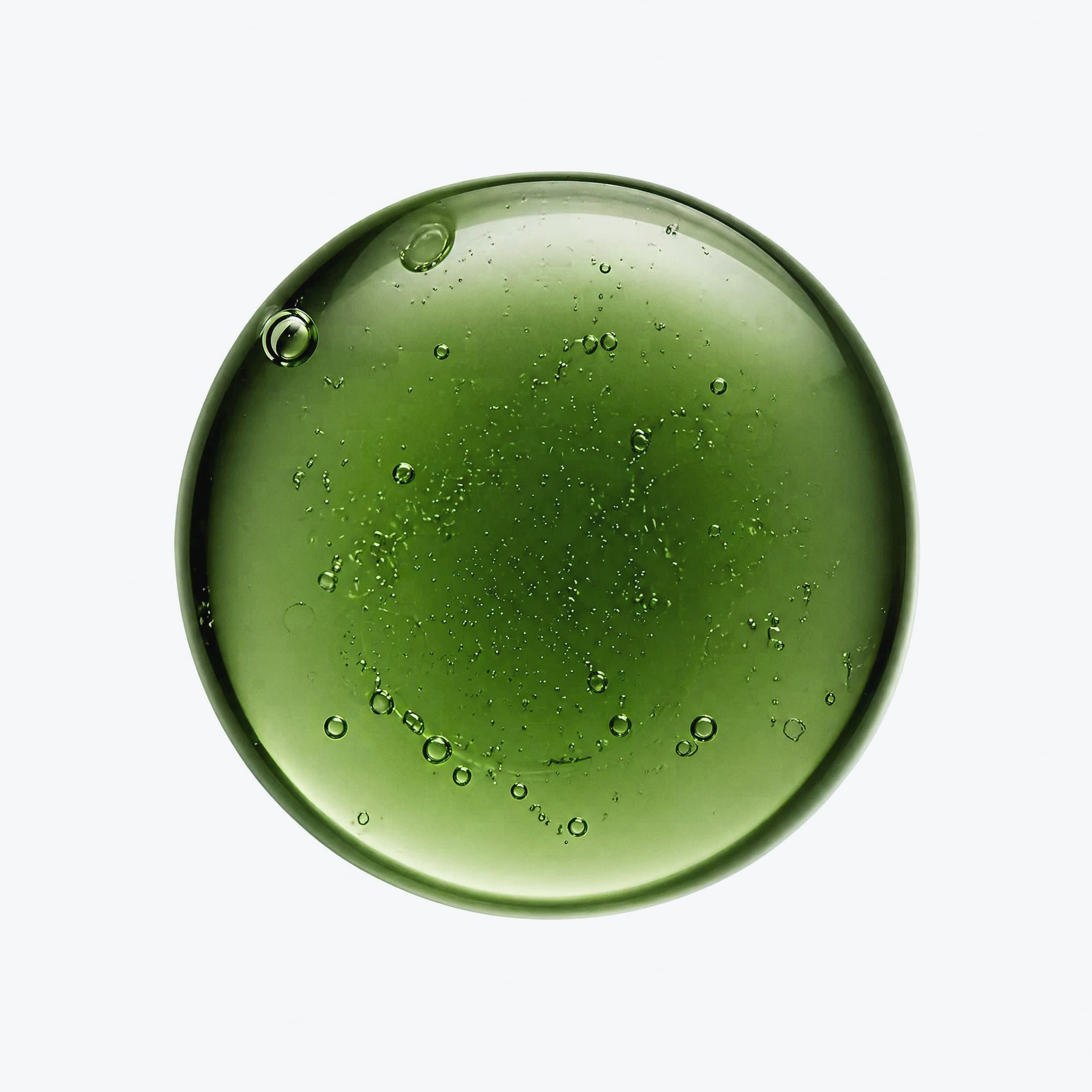 Clinical green liquid detail representing chlorophyll and the REFRESH formula foundation.